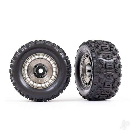 Traxxas Tyres and wheels, assembled, glued (3.8in satin black chrome wheels, satin black chrome wheel covers, Sledgehammer tyres